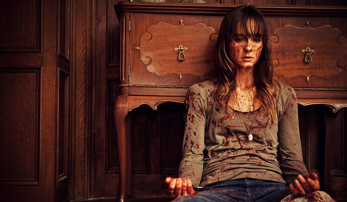 Sharni Vinson covered in blood in You're Next